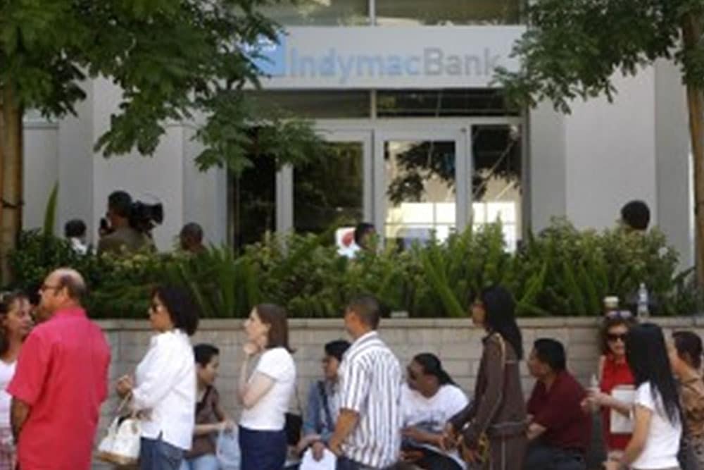 people standing in front of bank