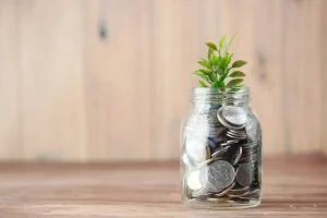 Change saved up in a glass jar.